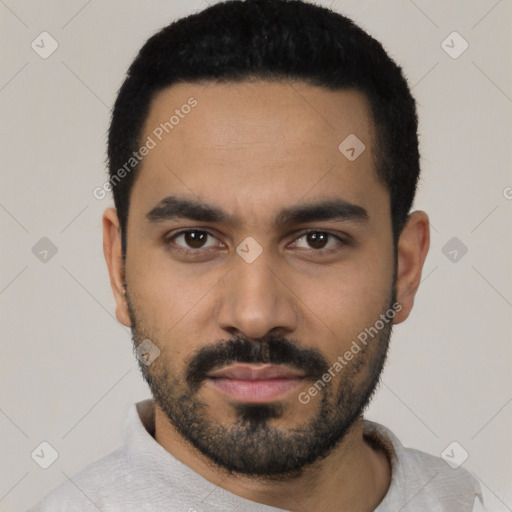 Neutral latino young-adult male with short  black hair and brown eyes