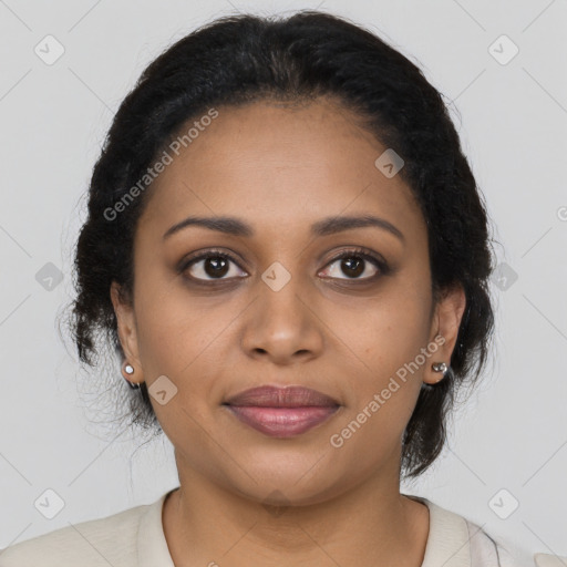 Joyful black young-adult female with medium  brown hair and brown eyes