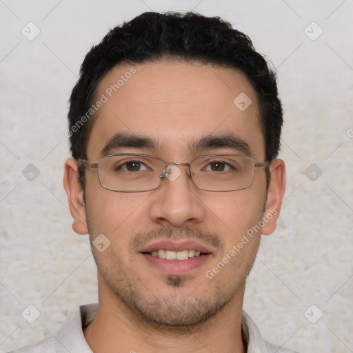 Joyful white young-adult male with short  black hair and brown eyes