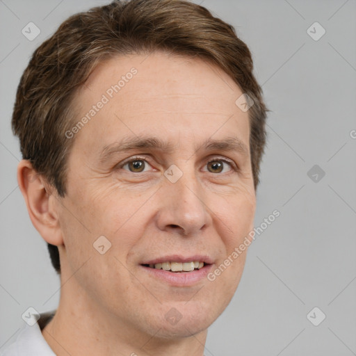 Joyful white adult male with short  brown hair and grey eyes