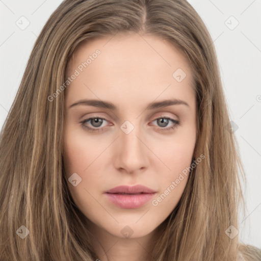 Neutral white young-adult female with long  brown hair and brown eyes