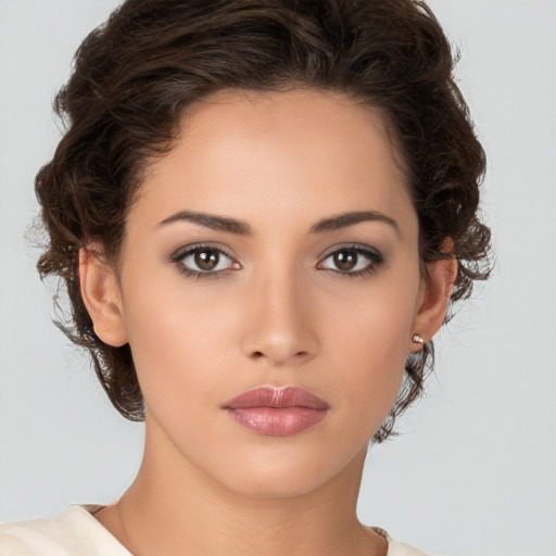 Neutral white young-adult female with medium  brown hair and brown eyes