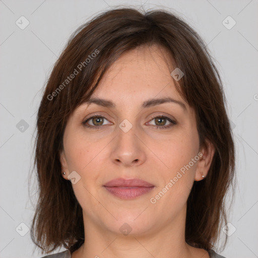 Joyful white adult female with medium  brown hair and brown eyes