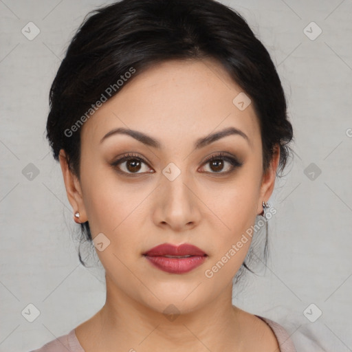 Joyful white young-adult female with medium  black hair and brown eyes