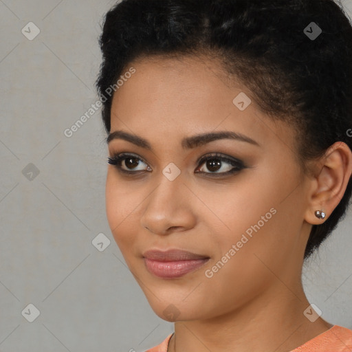 Joyful latino young-adult female with short  black hair and brown eyes