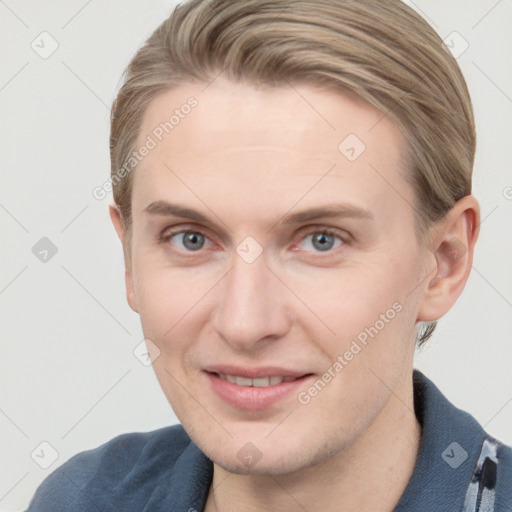 Joyful white young-adult female with short  brown hair and blue eyes