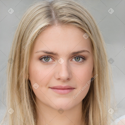 Joyful white young-adult female with long  brown hair and green eyes