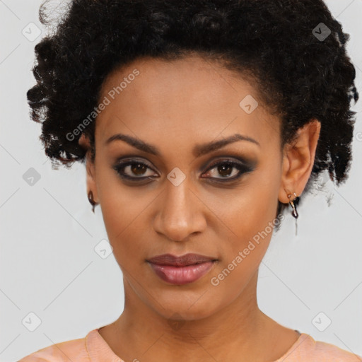 Joyful black young-adult female with short  brown hair and brown eyes