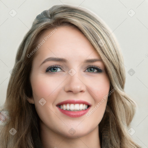 Joyful white young-adult female with long  brown hair and blue eyes