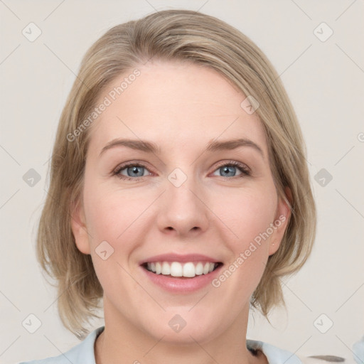 Joyful white young-adult female with medium  brown hair and blue eyes