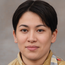 Joyful asian young-adult female with medium  brown hair and brown eyes