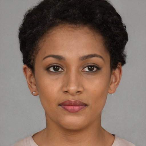 Neutral latino young-adult female with short  brown hair and brown eyes