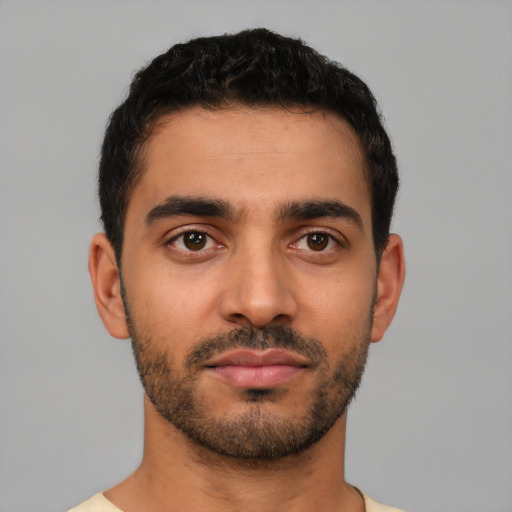Neutral latino young-adult male with short  black hair and brown eyes