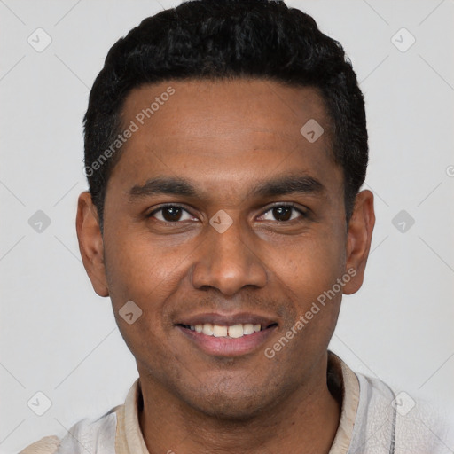 Joyful black young-adult male with short  black hair and brown eyes