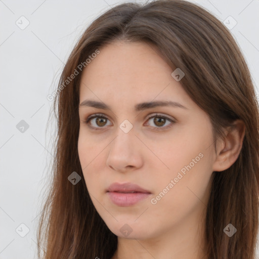 Neutral white young-adult female with long  brown hair and brown eyes