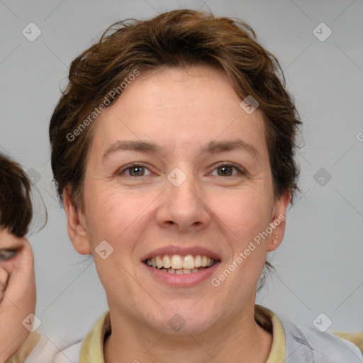 Joyful white young-adult female with medium  brown hair and blue eyes