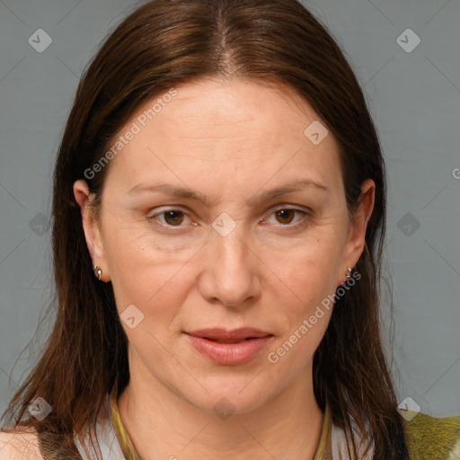 Joyful white adult female with medium  brown hair and brown eyes