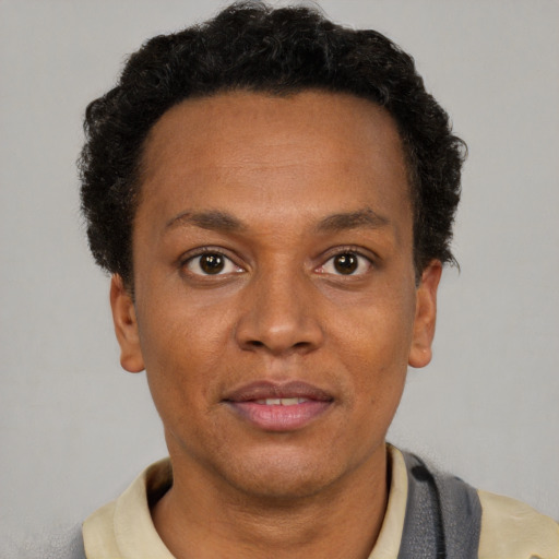 Neutral black adult female with short  brown hair and brown eyes