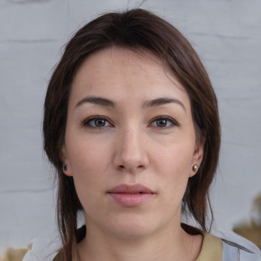 Neutral white young-adult female with medium  brown hair and brown eyes