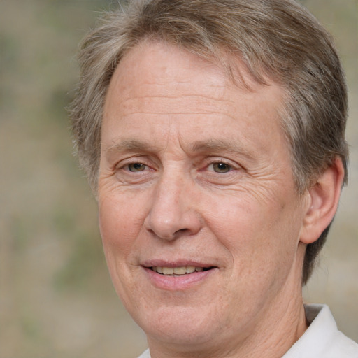 Joyful white middle-aged male with short  brown hair and brown eyes