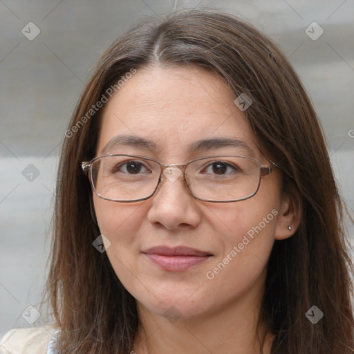 Joyful white adult female with long  brown hair and brown eyes