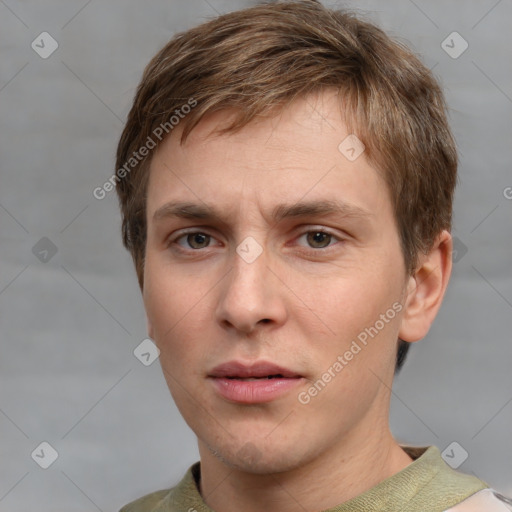 Neutral white young-adult male with short  brown hair and grey eyes