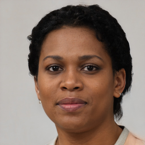 Neutral black young-adult female with short  black hair and brown eyes