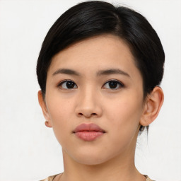 Neutral asian young-adult female with medium  black hair and brown eyes