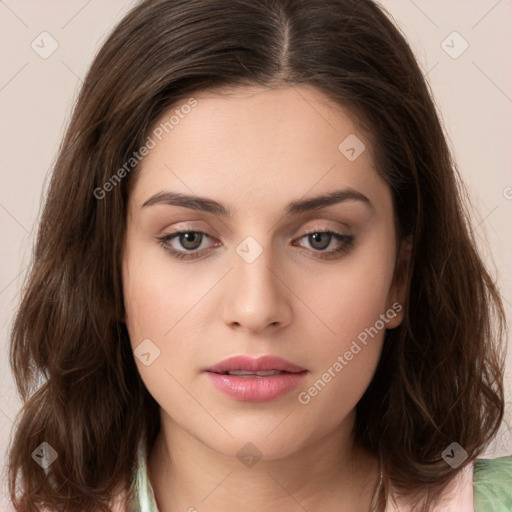 Neutral white young-adult female with long  brown hair and brown eyes