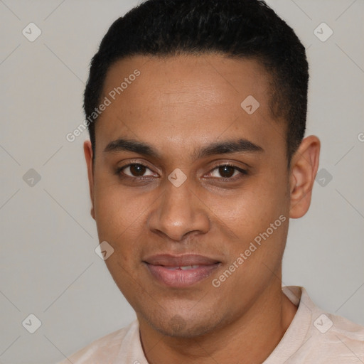 Joyful black young-adult male with short  black hair and brown eyes