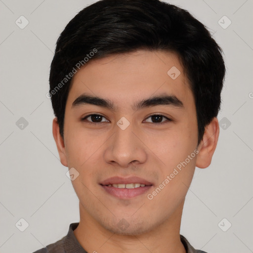 Joyful asian young-adult male with short  black hair and brown eyes