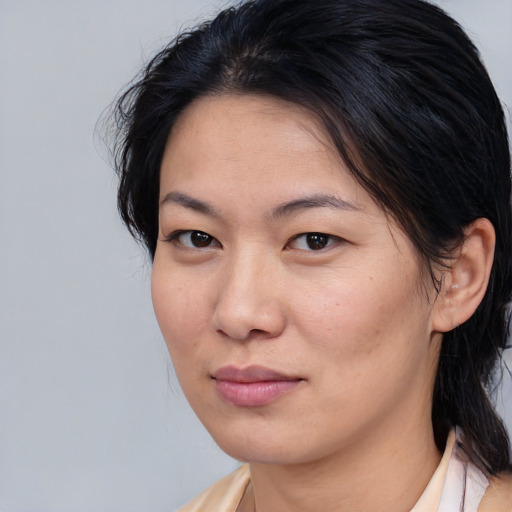 Neutral asian young-adult female with medium  brown hair and brown eyes
