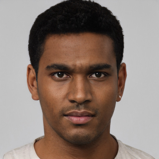 Neutral black young-adult male with short  black hair and brown eyes