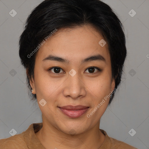 Joyful latino young-adult female with medium  brown hair and brown eyes