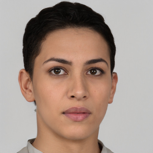 Neutral latino young-adult female with short  brown hair and brown eyes