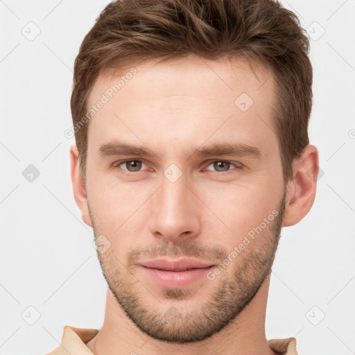 Neutral white young-adult male with short  brown hair and grey eyes