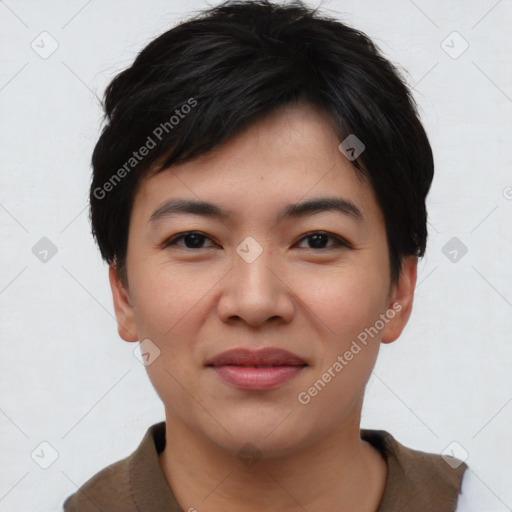 Joyful asian young-adult female with short  black hair and brown eyes