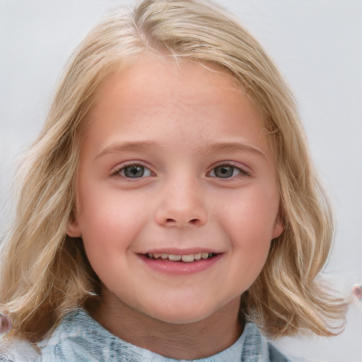 Joyful white child female with medium  brown hair and blue eyes