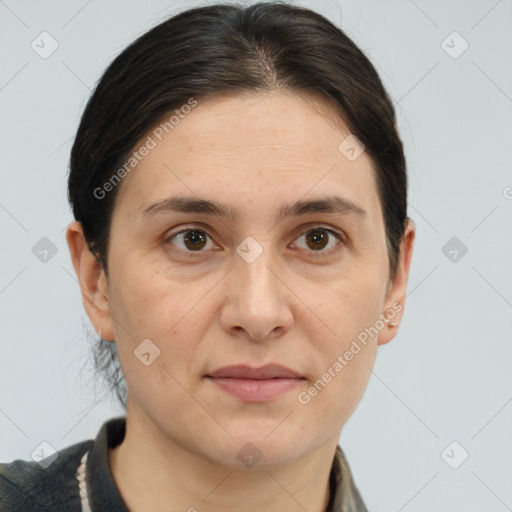 Joyful white adult female with short  brown hair and brown eyes