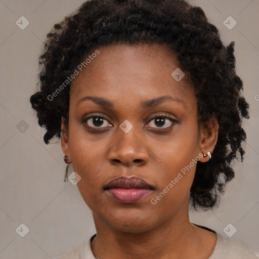 Neutral black young-adult female with medium  black hair and brown eyes