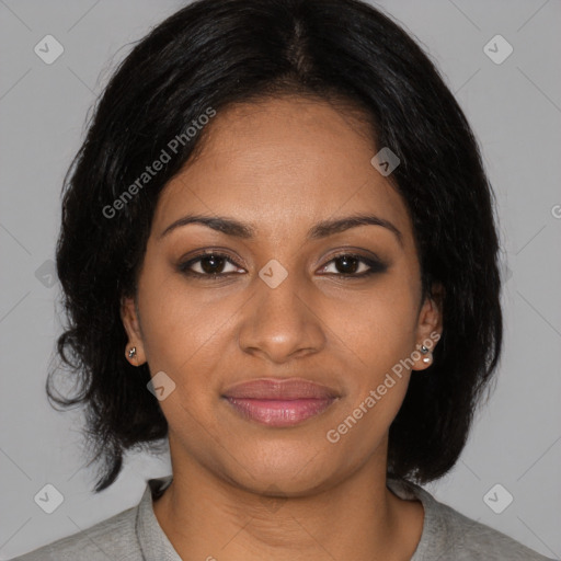 Joyful black young-adult female with medium  brown hair and brown eyes