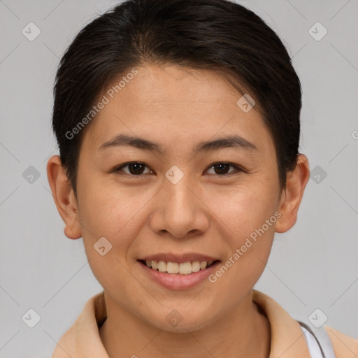 Joyful asian young-adult female with short  brown hair and brown eyes