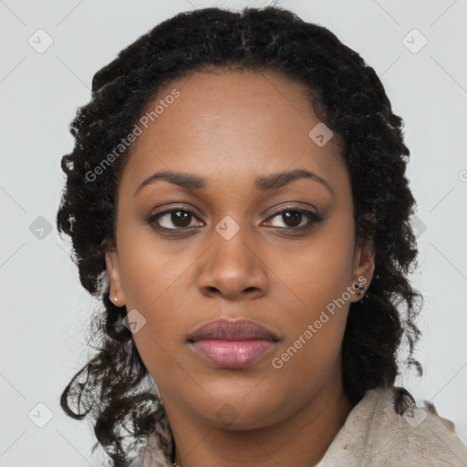 Joyful black young-adult female with long  black hair and brown eyes