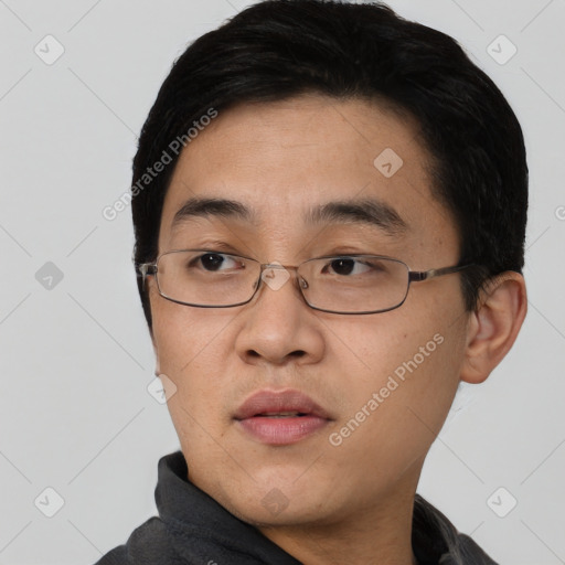 Neutral asian young-adult male with short  black hair and brown eyes