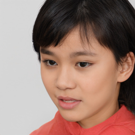 Neutral asian child female with short  brown hair and brown eyes