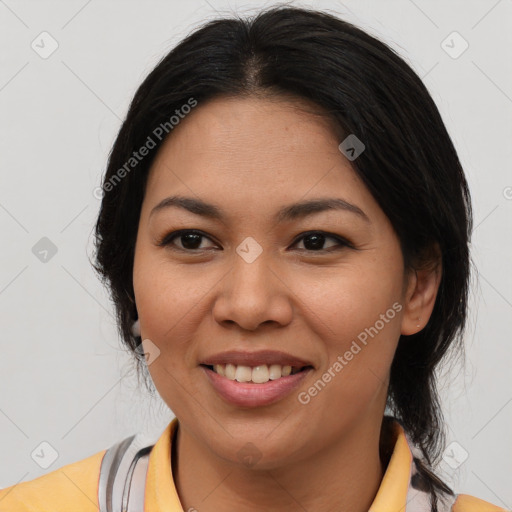 Joyful asian young-adult female with medium  black hair and brown eyes