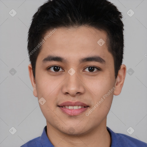 Joyful asian young-adult male with short  brown hair and brown eyes