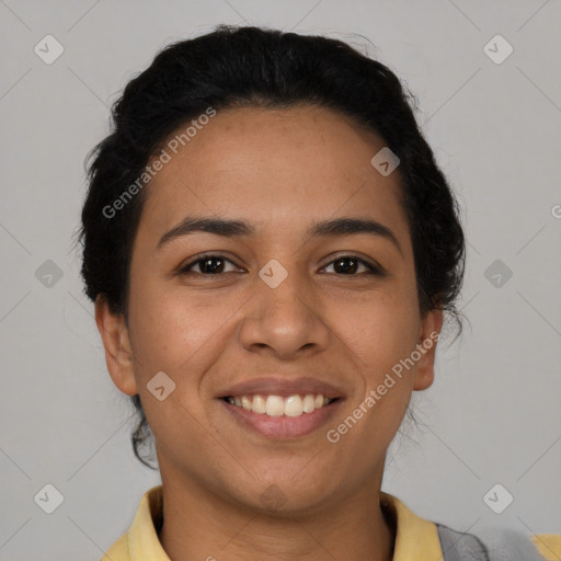 Joyful latino young-adult female with short  brown hair and brown eyes