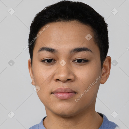 Joyful latino young-adult female with short  black hair and brown eyes