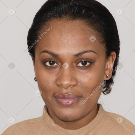 Joyful black young-adult female with short  black hair and brown eyes